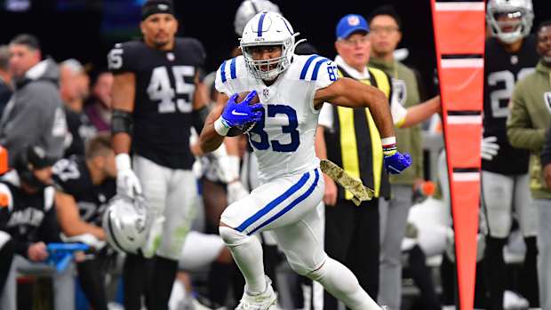 Nov 13, 2022; Paradise, Nevada, USA; Indianapolis Colts tight end Kylen Granson (83) runs the ball against the Las Vegas Raiders during the first half at Allegiant Stadium.